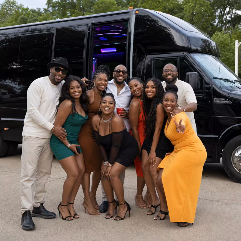 Party bus interior with wraparound leather seating and LED lighting in Tampa