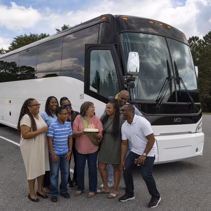 Passengers loading luggage while boarding an Tampa group shuttle
