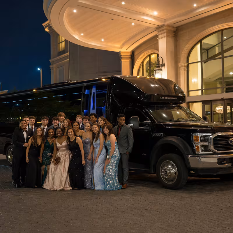 Party bus interior with wraparound leather seating and LED lighting in Tampa