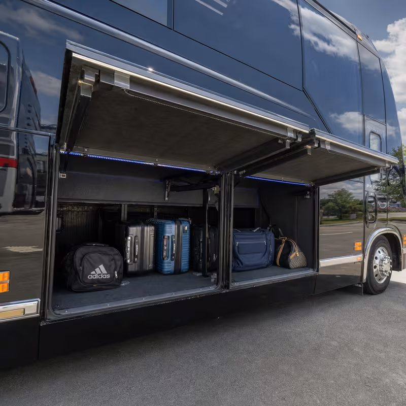 Party bus interior with wraparound leather seating and LED lighting in Tampa