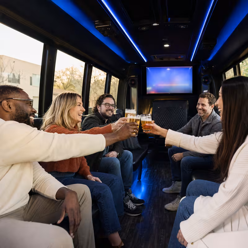 Group boarding a white charter bus for Winery & Brewery Tour Transportation transportation in Tampa